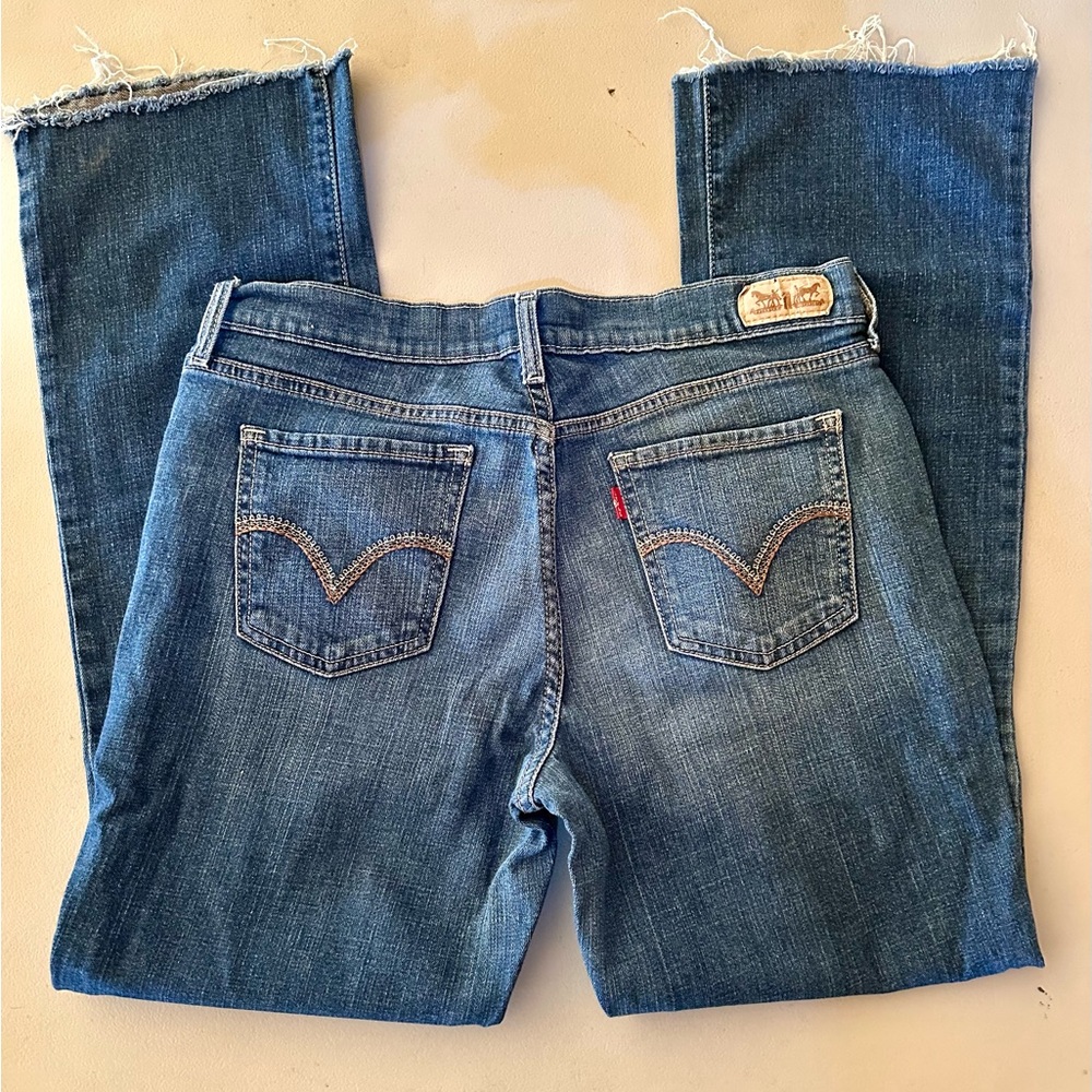 Levi’s 515 Jeans, Size 8 Bootcut, Cut-off hems, yarn detail stitching